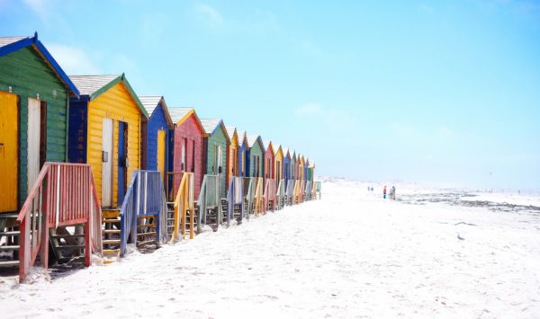 Colorful beach huts on beach