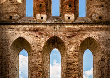 Brown concrete pillar under blue sky