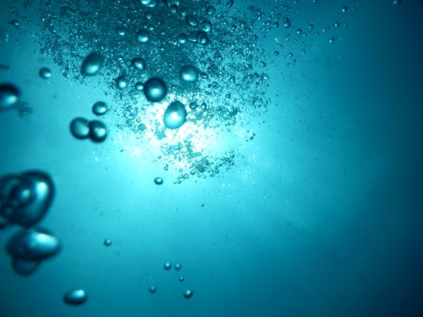Water drops on blue background