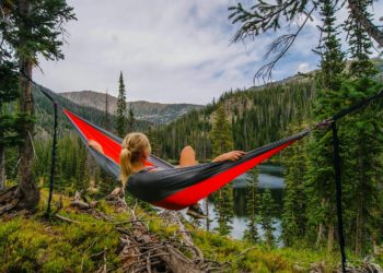 woman on hammock near to river