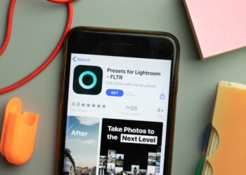 New York, United States - 7 November 2020: Phone screen close-up with Presets for Lightroom FLTR mobile app logo on display, Illustrative Editorial.