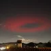 Un fotografo cattura un rarissimo anello di luce rossa a 285km da Ancona